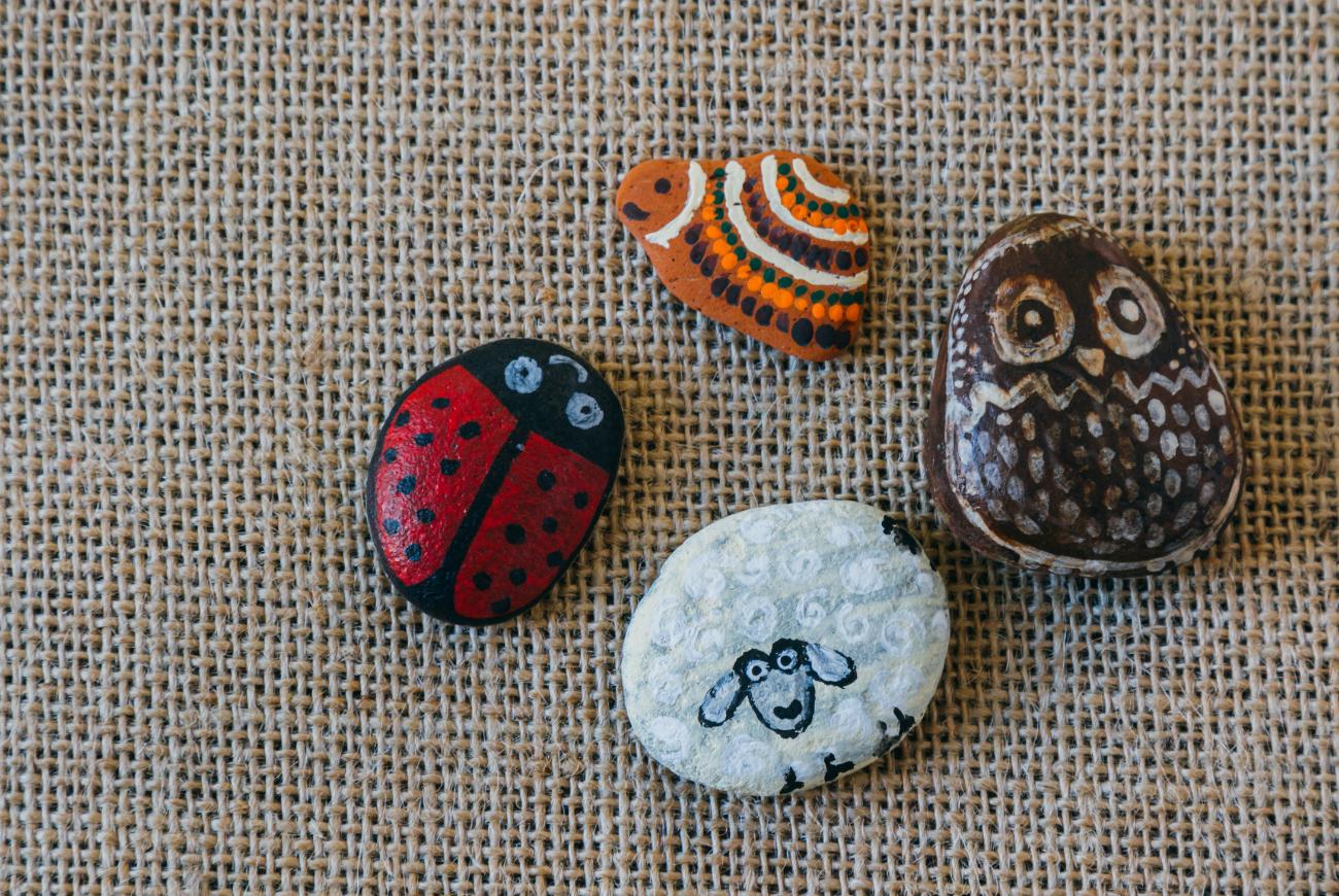 Four painted stones.