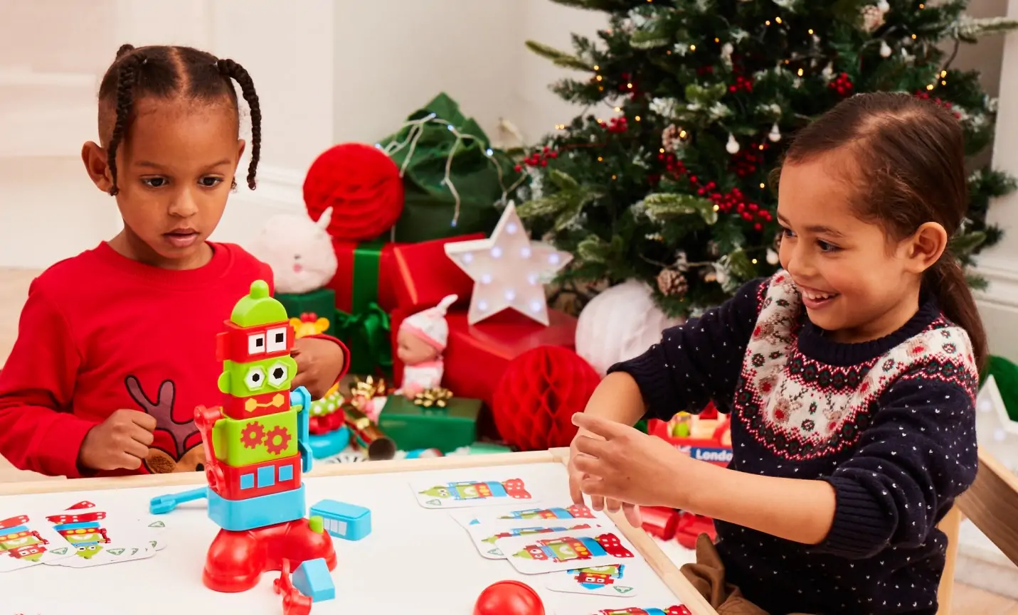 Two kids play with toys.