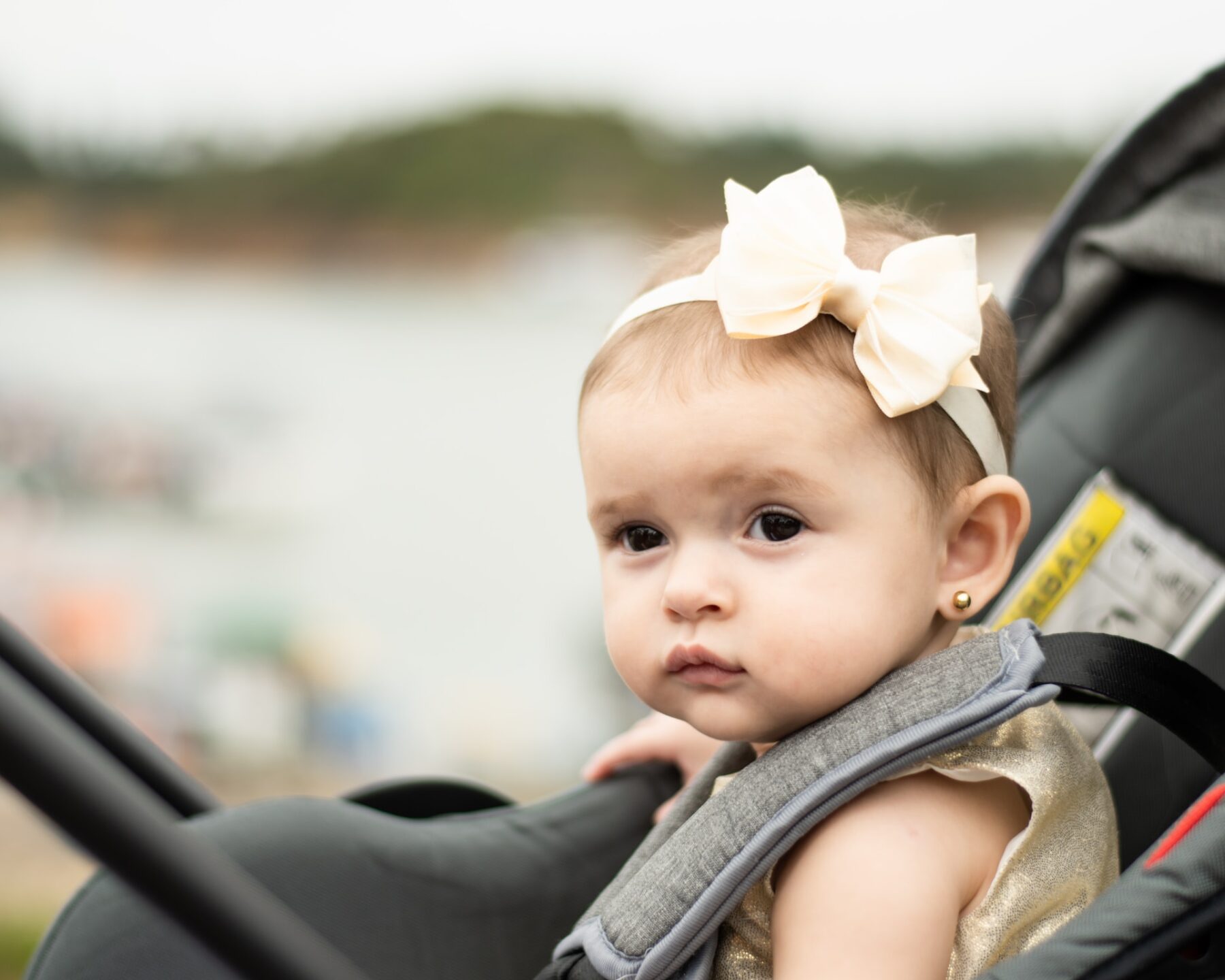 Baby in car seat.