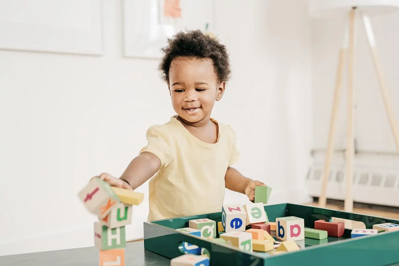 Boy learning with blocks