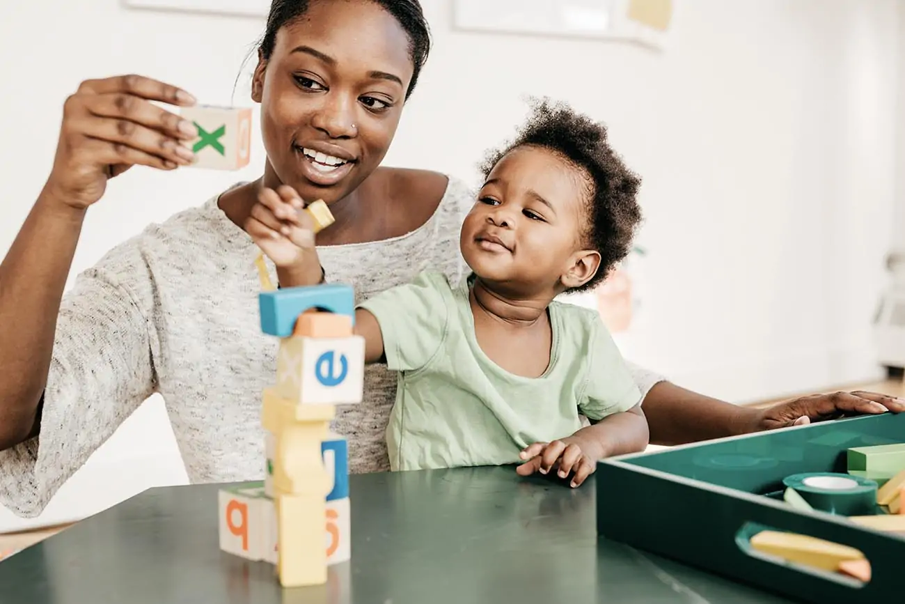 Toddler learning phonics.