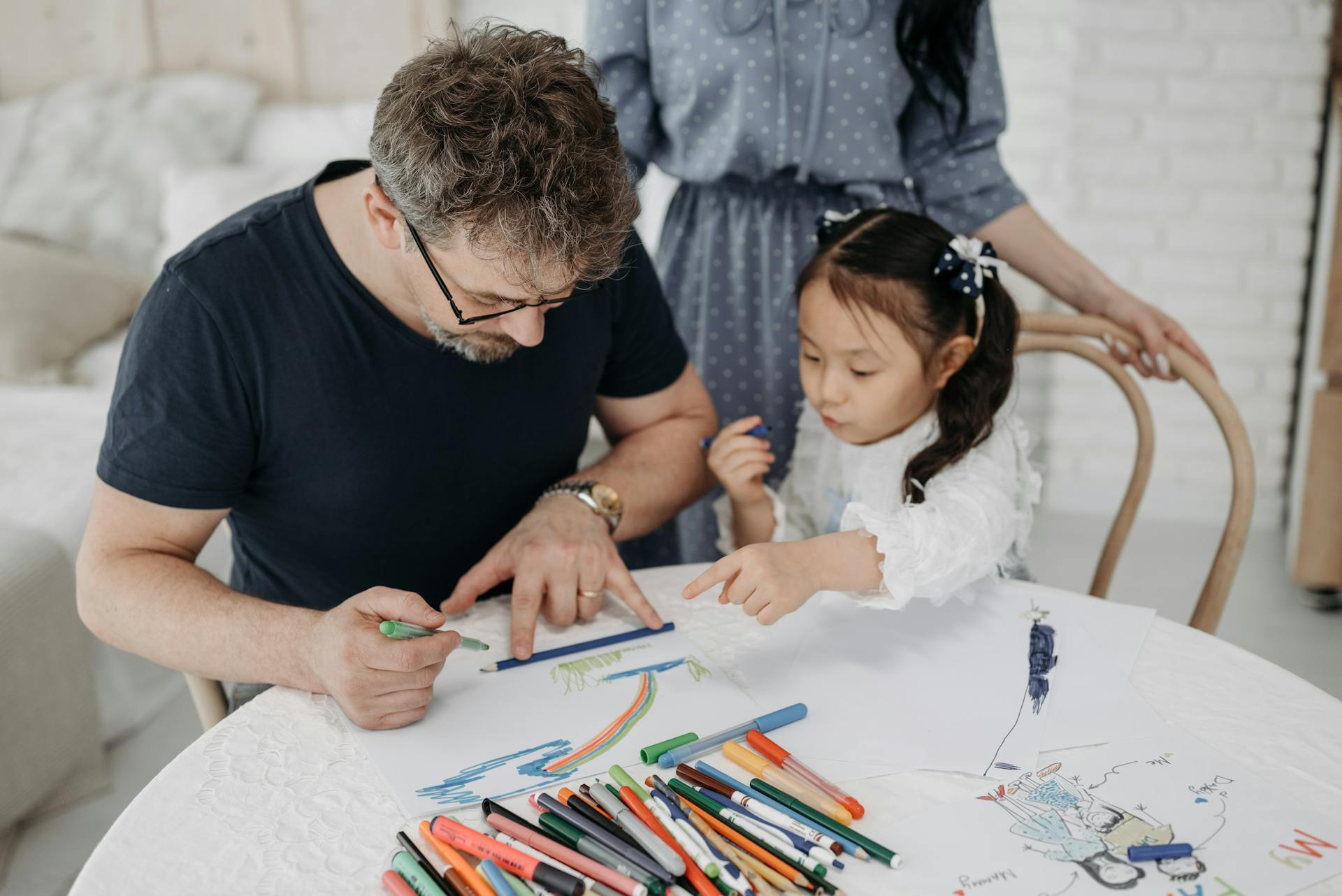 Child colouring with parent.