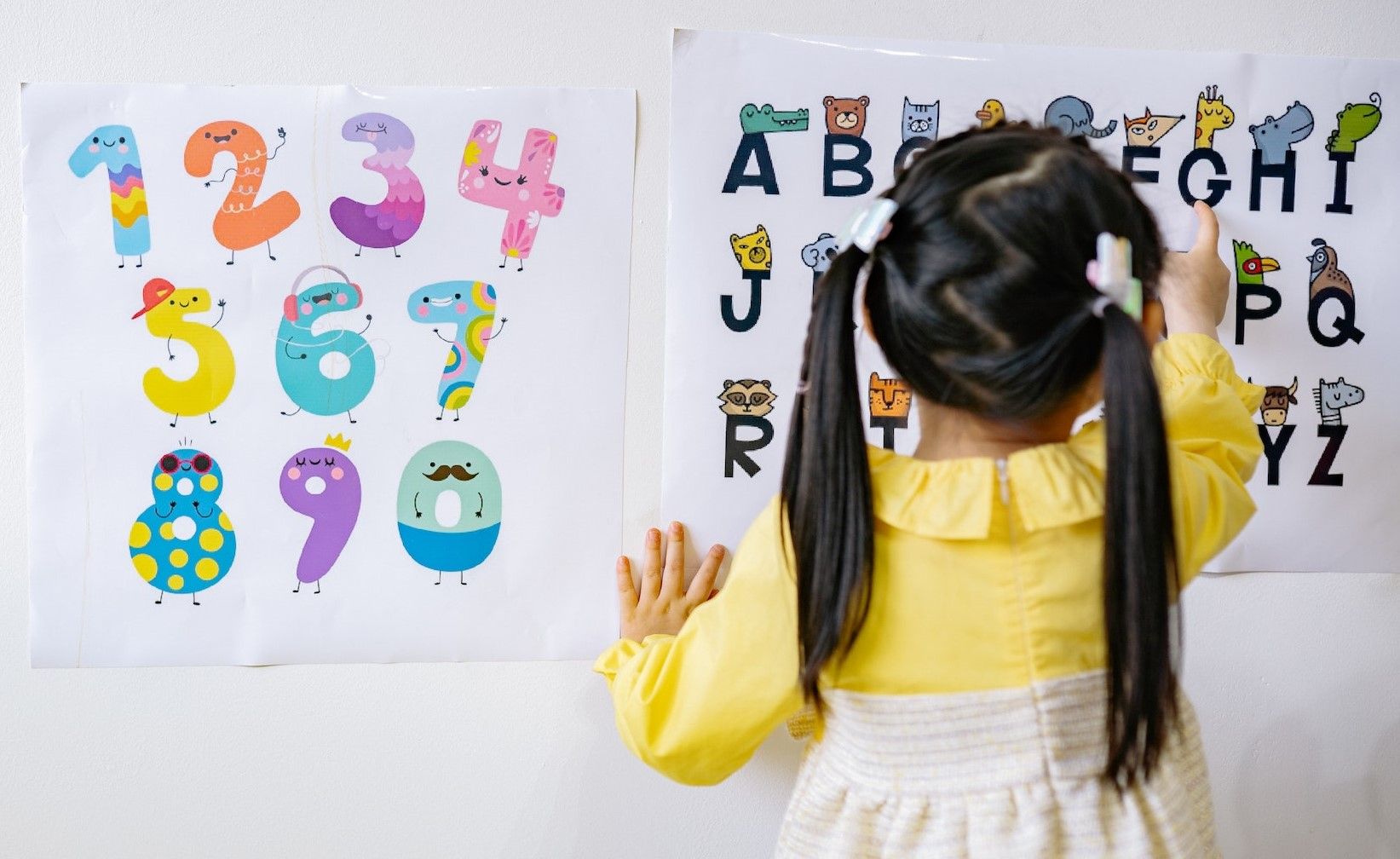 Girl learning phonics.