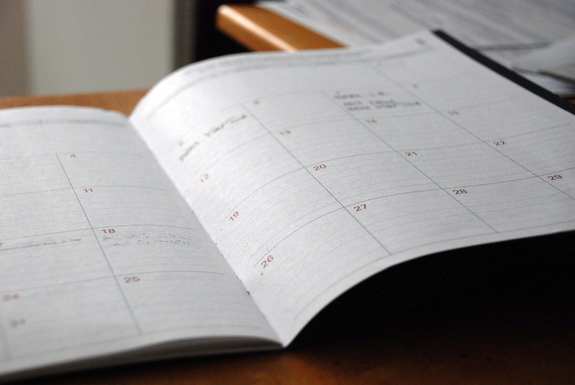 A book showing a monthly calendar.