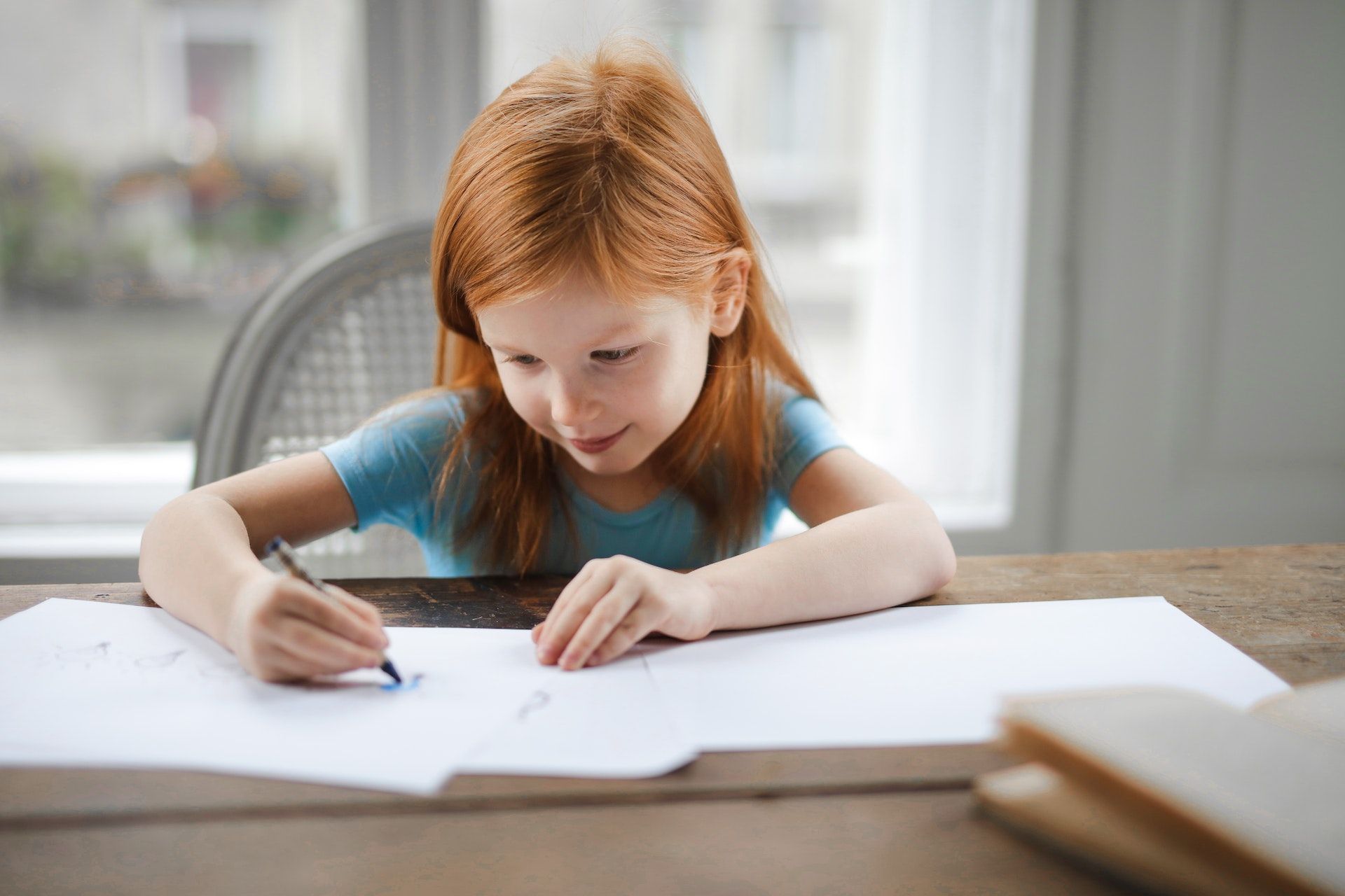 Child learning to write.